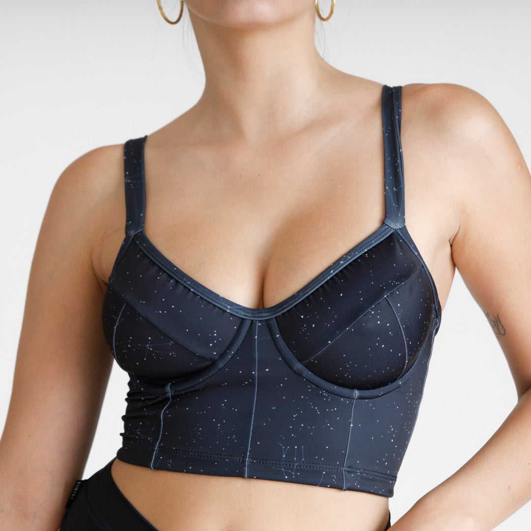 Bustier estampado Constelaciones con soporte y barba, copas B a D, UV+50 — Kinibe