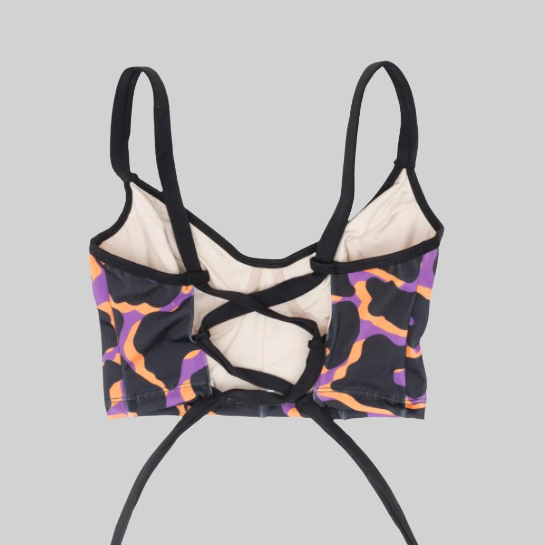Bustier estampado de manchas naranjo con soporte, copas B a D, vista espalda — Kinibe