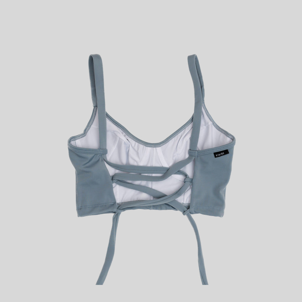 Bustier gris celeste con soporte y barba, copas B a D, vista espalda — Kinibe