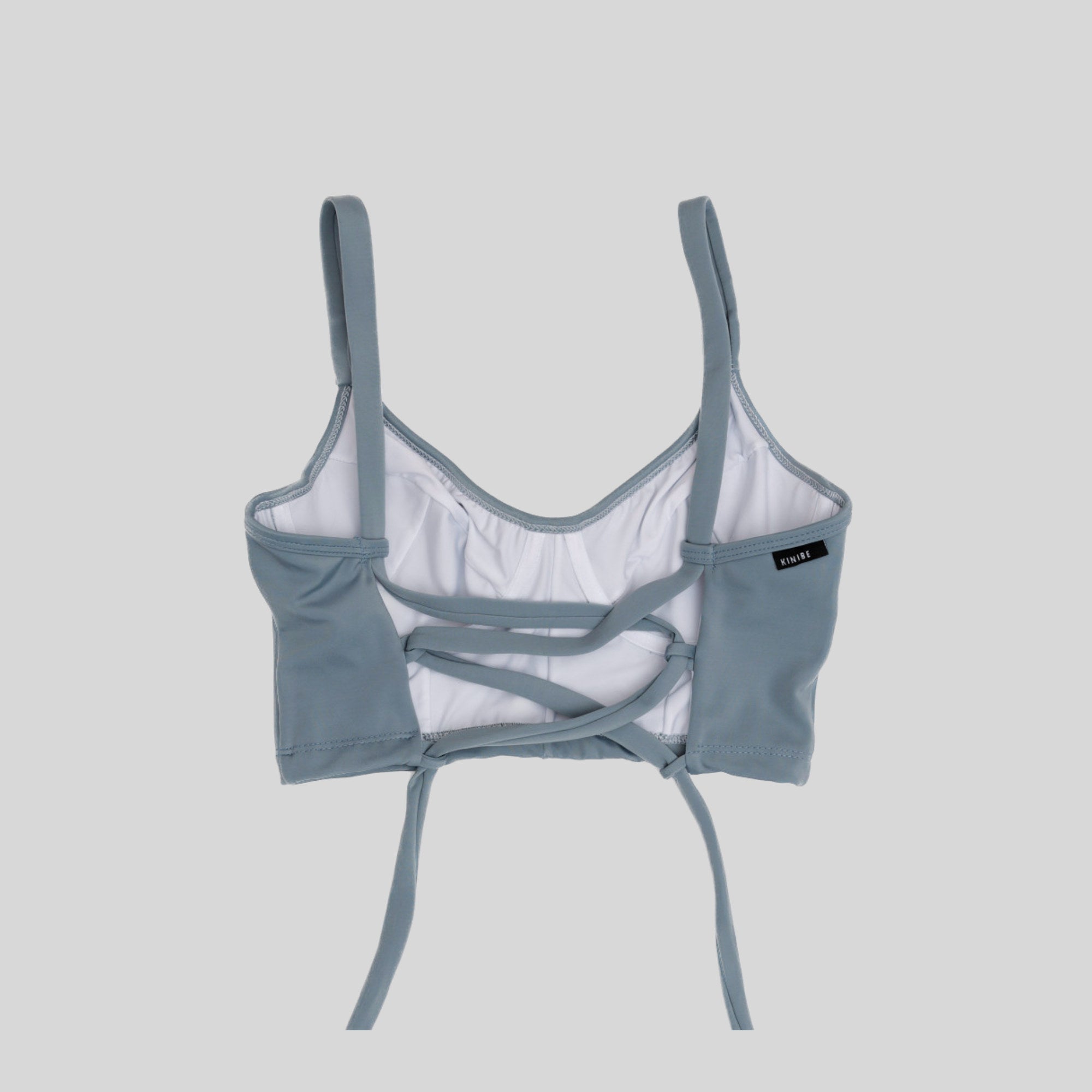 Bustier gris celeste con soporte y barba, copas B a D, vista espalda — Kinibe