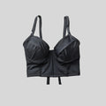 Bustier negro con soporte y barba, copas B a D, vista frontal — Kinibe
